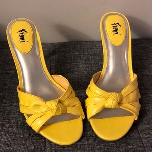 Yellow sandals with high heels